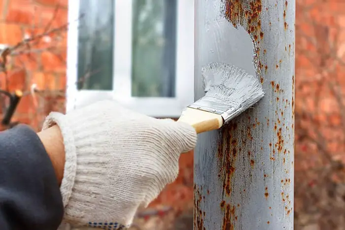 how to apply primer for rusted metal